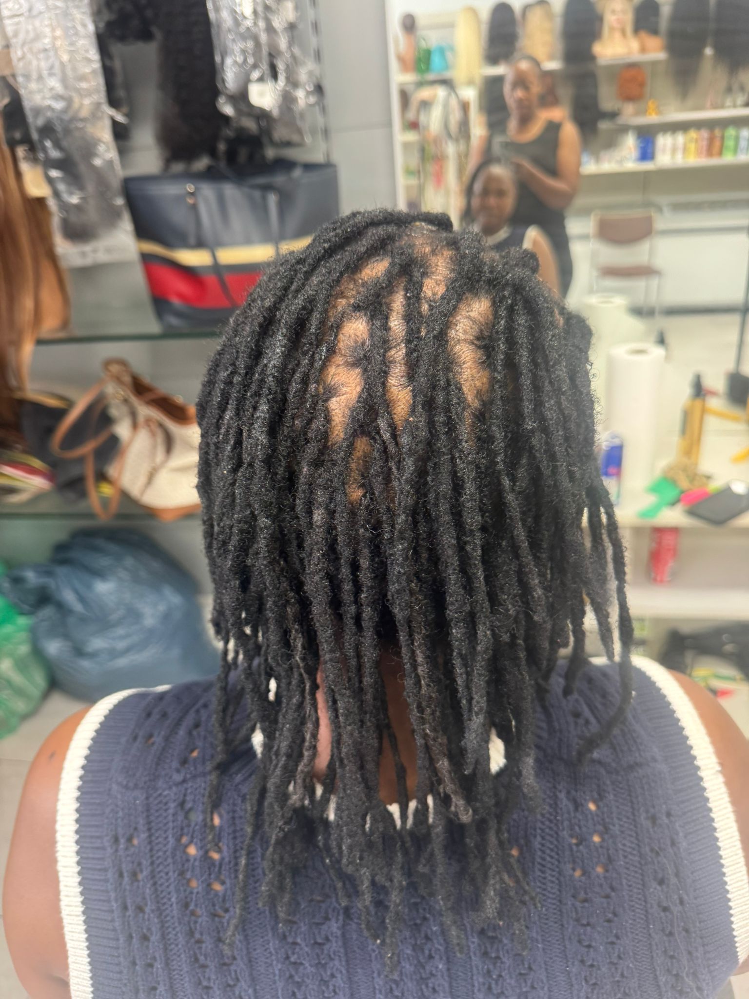 Fresh loc style by Makenene Afro Hair Salon